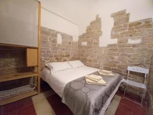 Llit o llits en una habitació de Antica Torre Medievale