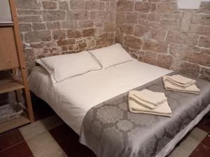 Llit o llits en una habitació de Antica Torre Medievale