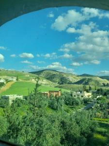 a view of a village in the hills at Pella Countryside hotel 