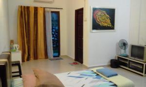 TV a/nebo společenská místnost v ubytování MELATI INN