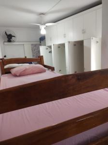 Uma cama ou camas num quarto em Varandas da Paulista