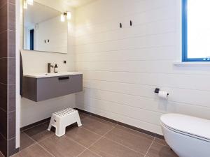 a bathroom with a sink and a toilet at 8 person holiday home in Hirtshals-By Traum in Hirtshals +33 photos