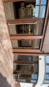 a set of three glass windows in a building at El Cairo Cahul in Cahul