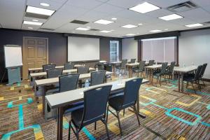 a classroom with tables and chairs in a room at Residence Inn by Marriott Chicago Schaumburg/Woodfield Mall in Schaumburg +16 photos