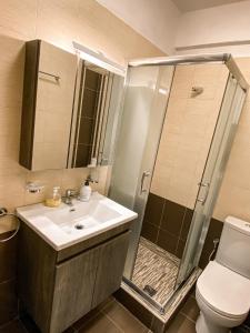 Kúpeľňa v ubytovaní Luxury Equiped Apartment - Olympic Beach
