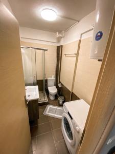 Kúpeľňa v ubytovaní Luxury Equiped Apartment - Olympic Beach