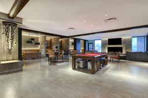 a room with a ping pong table in the middle at Boulder Marriott in Boulder