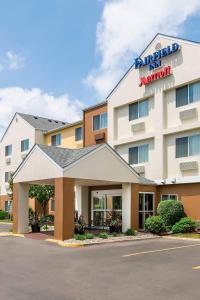 a hotel with a sign on the front of it at Fairfield Inn & Suites Jackson in Jackson