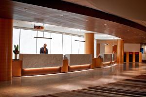 a man is standing in the lobby of a hotel at Atlanta Marriott Marquis in Atlanta