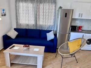 Kuchnia lub aneks kuchenny w obiekcie GATU Villa Atardecer en la playa de las Redes " Preferente mayores de 21 años y familias "