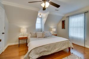 a bedroom with a bed and a ceiling fan at Cozy Virginia Vacation Rental with Seasonal Pool! in Nokesville +31 photos
