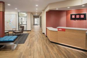 a lobby of a hospital with a waiting room at TownePlace Suites by Marriott Dubuque Downtown in Dubuque