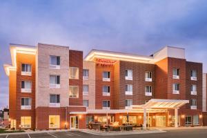 a rendering of a hotel in a parking lot at TownePlace Suites by Marriott Dubuque Downtown in Dubuque