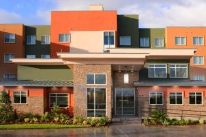 an office building with colorful at Residence Inn by Marriott Houston Pasadena in Pasadena