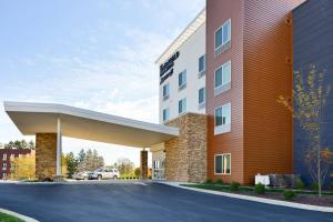 a rendering of a hotel with a parking lot at Fairfield Inn & Suites by Marriott Martinsburg in Martinsburg