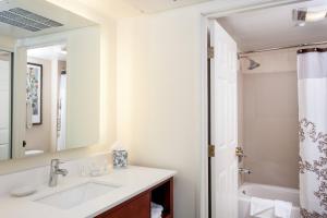 a bathroom with a sink and a mirror at Residence Inn by Marriott Las Vegas Henderson/Green Valley in Las Vegas