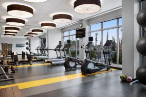 a gym with treadmills and elliptical machines at Fairfield Inn & Suites by Marriott Daytona Beach Speedway/Airport in Daytona Beach