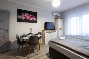 Voodi või voodid majutusasutuse Csipke Apartman toas