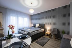 Voodi või voodid majutusasutuse Csipke Apartman toas