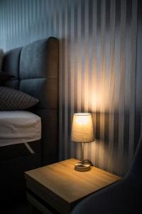 Voodi või voodid majutusasutuse Csipke Apartman toas