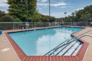 a large swimming pool with blue water at Residence Inn by Marriott Little Rock in Little Rock