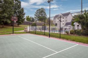 a tennis court in front of a house at Residence Inn by Marriott Little Rock in Little Rock