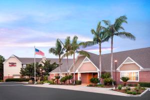 a rendering of the front of a hotel with palm trees at Residence Inn San Diego Sorrento Mesa/Sorrento Valley in Sorrento