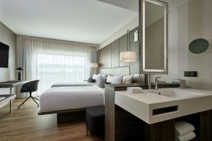Postel nebo postele na pokoji v ubytování AC Hotel by Marriott Strasbourg