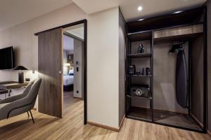 TV a/nebo společenská místnost v ubytování AC Hotel by Marriott Strasbourg