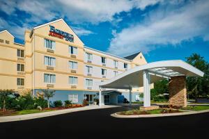a rendering of a hotel with a hotel entrance at Fairfield Inn Myrtle Beach Broadway at the Beach in Myrtle Beach
