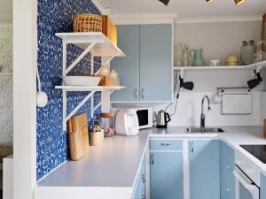 Kuchyň nebo kuchyňský kout v ubytování 4 person holiday home in VARBERG-By Traum + 29 fotografií