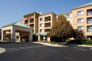 a hotel with a parking lot in front of it at Courtyard by Marriott Richmond Northwest in Henrico