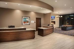 a lobby of a hotel with a waiting room at Residence Inn by Marriott Seattle South/Renton in Renton