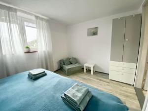 Posteľ alebo postele v izbe v ubytovaní Apartmán Eden