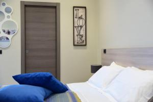 Posteľ alebo postele v izbe v ubytovaní B&B Dimora dell' Etna