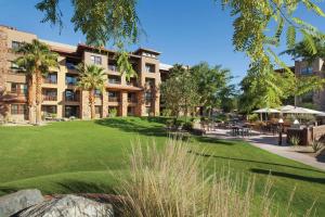 a large building with a park in front of it at The Westin Desert Willow Villas, Palm Desert in Palm Desert