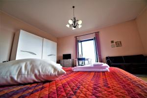 Posteľ alebo postele v izbe v ubytovaní B&B Dimora dell' Etna