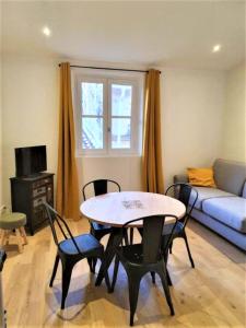 Χώρος καθιστικού στο Appart lumineux de l'Hôtel de Ville