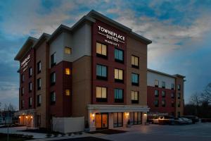 a building with a sign on the side of it at TownePlace Suites by Marriott College Park in College Park