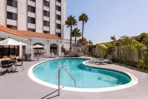 a swimming pool in front of a hotel at Courtyard by Marriott San Diego Miramar in San Diego