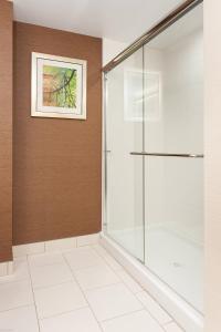 a shower in a bathroom with a glass door at Fairfield Inn & Suites by Marriott Vernon in Vernon