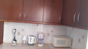 A kitchen or kitchenette at Eirinis home