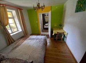 Postel nebo postele na pokoji v ubytování Lemon Garden
