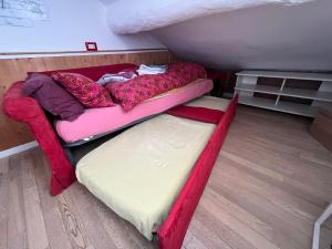 a bunk bed with a mattress and a bed frame in a room at Apartment A.C.& G.O. Milan in Milan