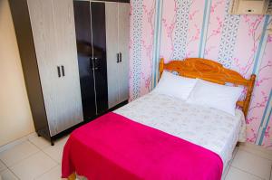 A bed or beds in a room at Apto com Wi-Fi e otima localizacao em Belem PA