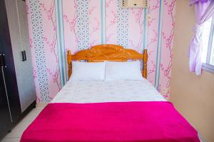 A bed or beds in a room at Apto com Wi-Fi e otima localizacao em Belem PA