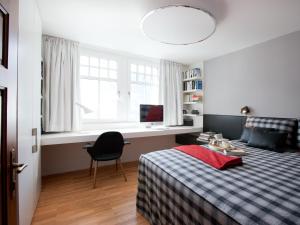 Postel nebo postele na pokoji v ubytování Boutique Apartments Bezau + 31 fotografií