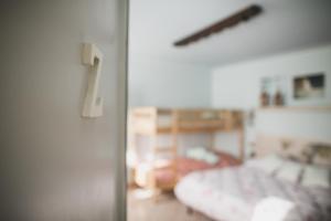 Postel nebo postele na pokoji v ubytování B&B LA MIMOSA E IL GELSOMINO
