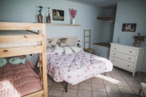 Postel nebo postele na pokoji v ubytování B&B LA MIMOSA E IL GELSOMINO