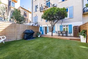 Vonkajšia záhrada v ubytovaní LB Vacation Rentals I A Quiet Place with Garden in the Heart of Cannes